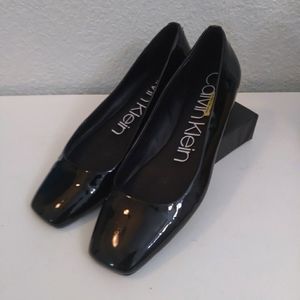 Black Calvin Klein flats